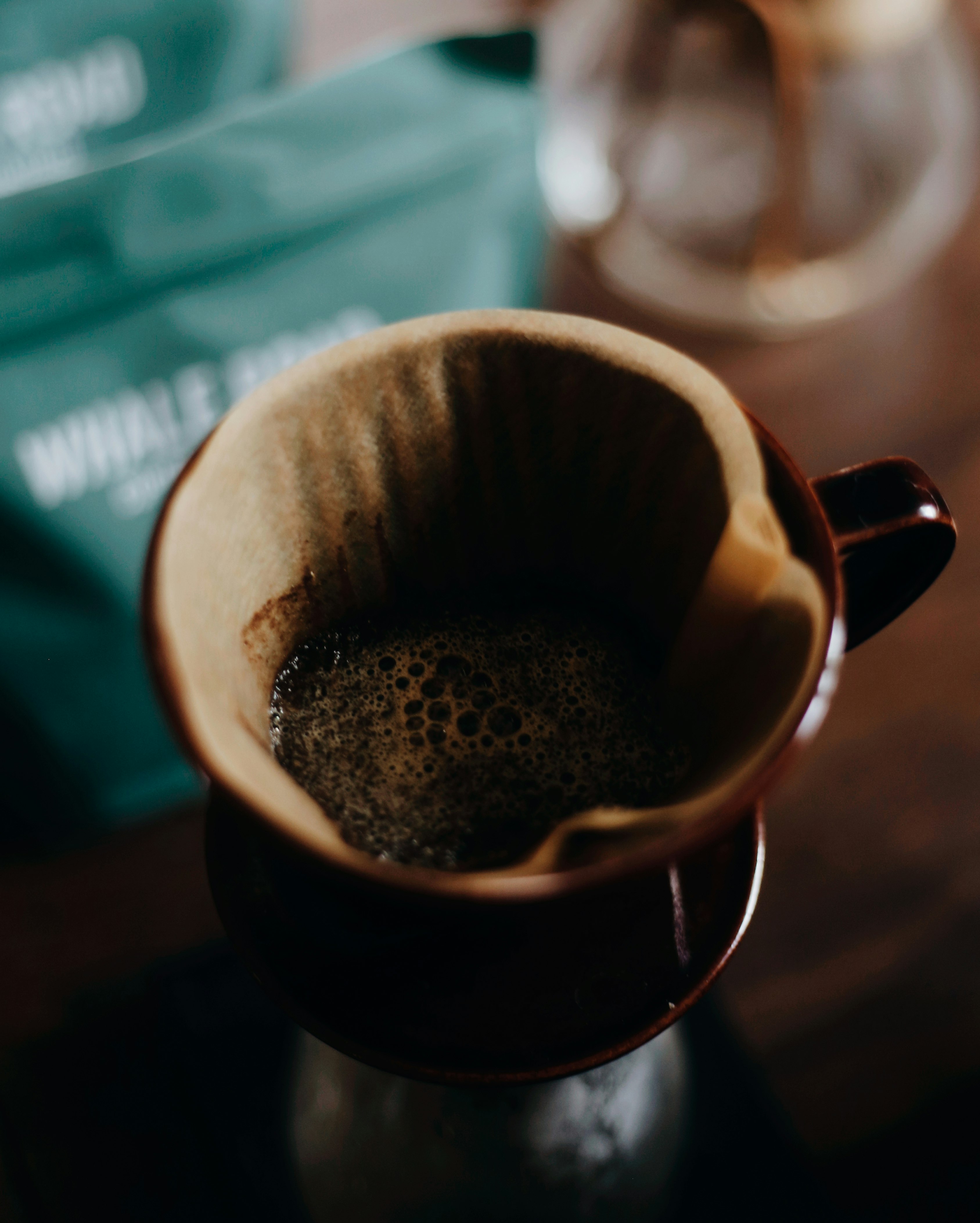 black and white ceramic mug with coffee